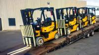 Tilt and Load / Roll Off Flatbed Transporation - Solid Hook Inc.